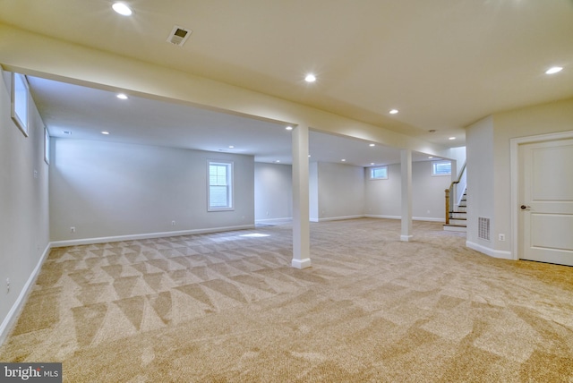 basement with light carpet