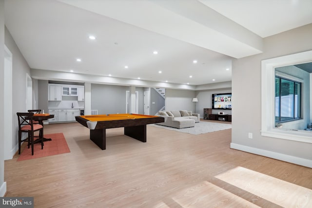 recreation room with a dry bar, recessed lighting, light wood-type flooring, billiards, and baseboards