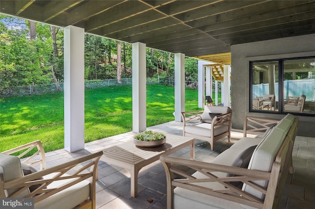 view of patio with an outdoor hangout area and a fenced backyard