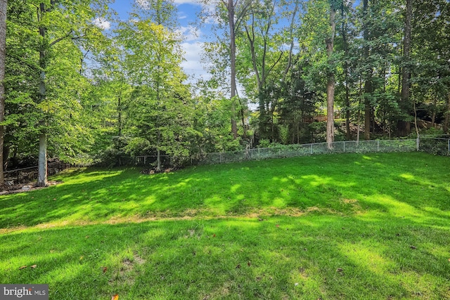 view of yard with fence