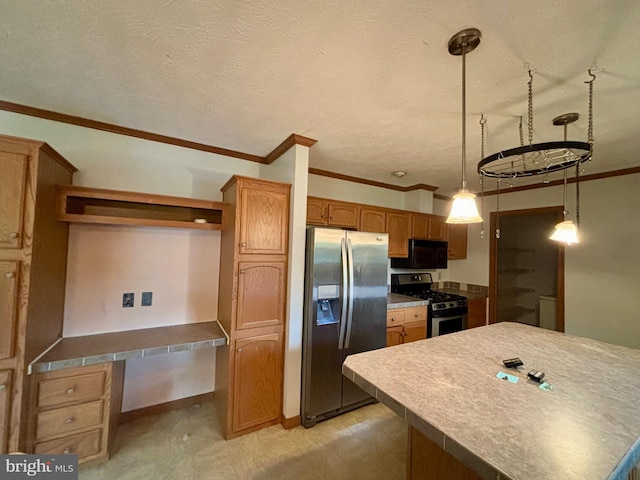 kitchen featuring appliances with stainless steel finishes, a textured ceiling, hanging light fixtures, and ornamental molding