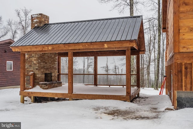 view of snow covered deck