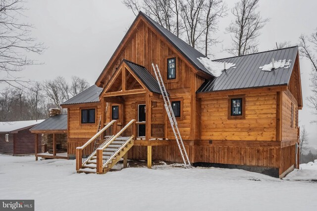 view of front of house featuring metal roof