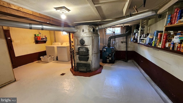 basement with separate washer and dryer