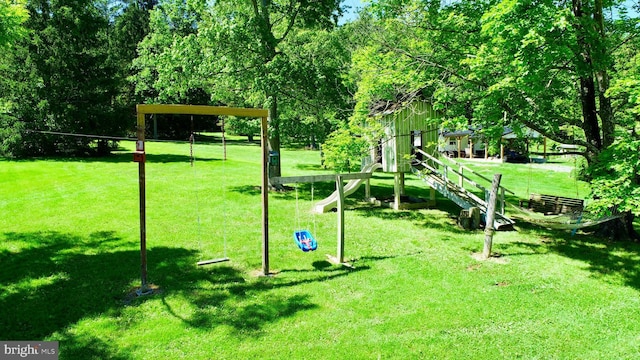 view of jungle gym featuring a yard