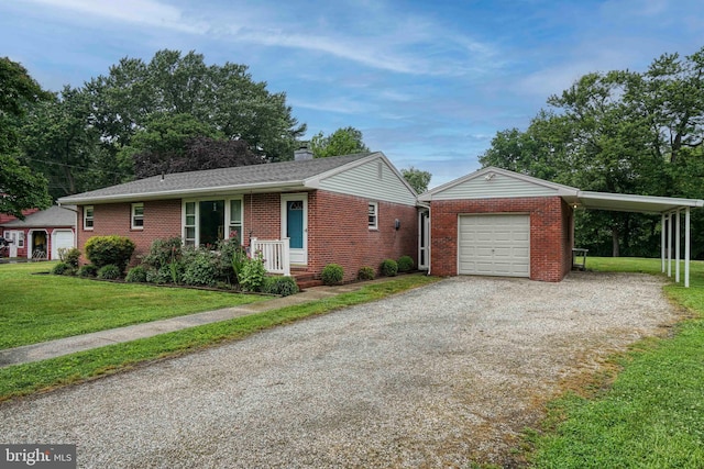 ranch-style home featuring a carport, a garage, and a front lawn