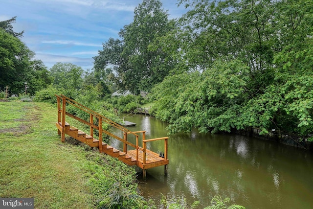 dock area featuring a water view