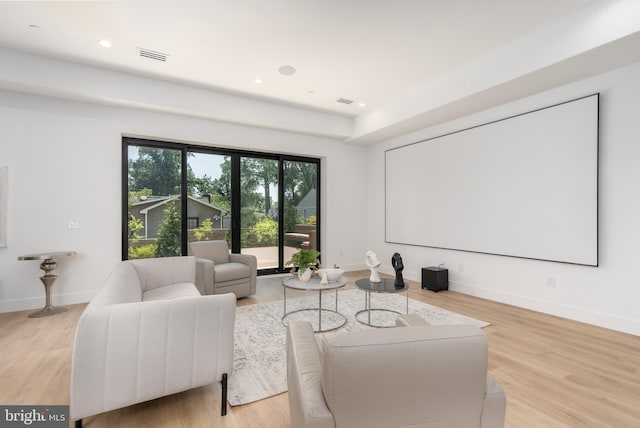 home theater featuring light hardwood / wood-style flooring