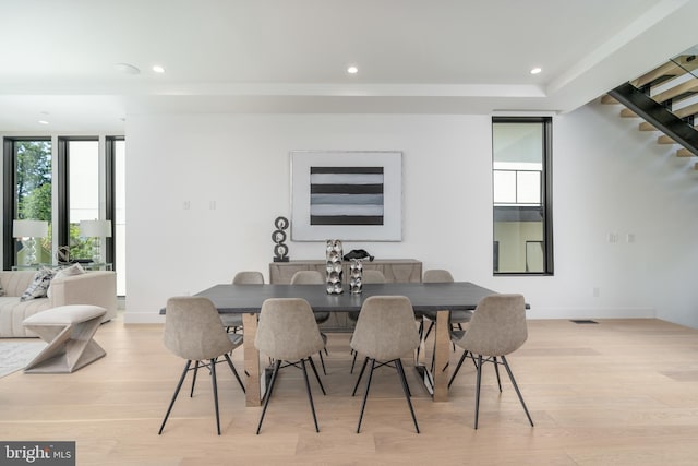 dining area with light hardwood / wood-style flooring