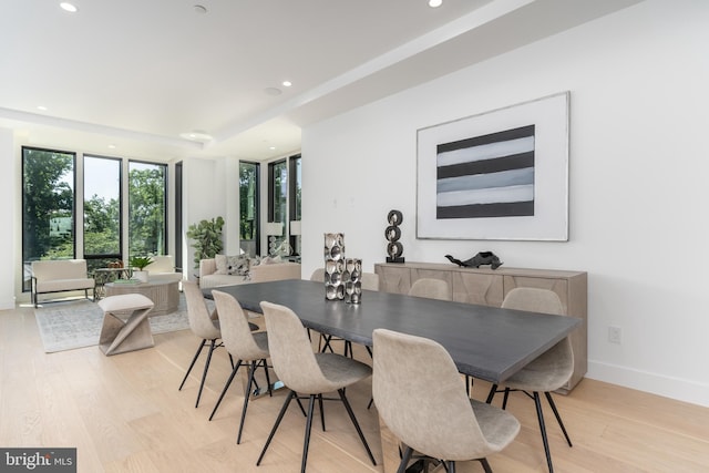 dining space featuring light hardwood / wood-style flooring