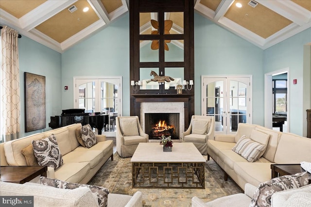 living room with french doors, coffered ceiling, crown molding, and a high ceiling