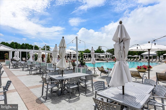 view of patio / terrace featuring a community pool