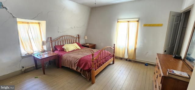 bedroom with light hardwood / wood-style flooring