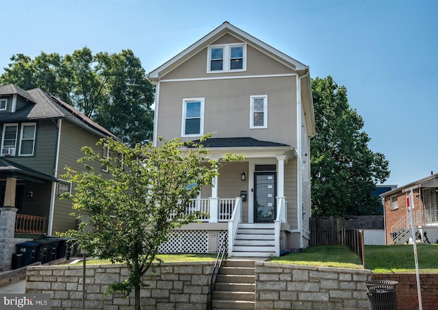 view of front property with covered porch