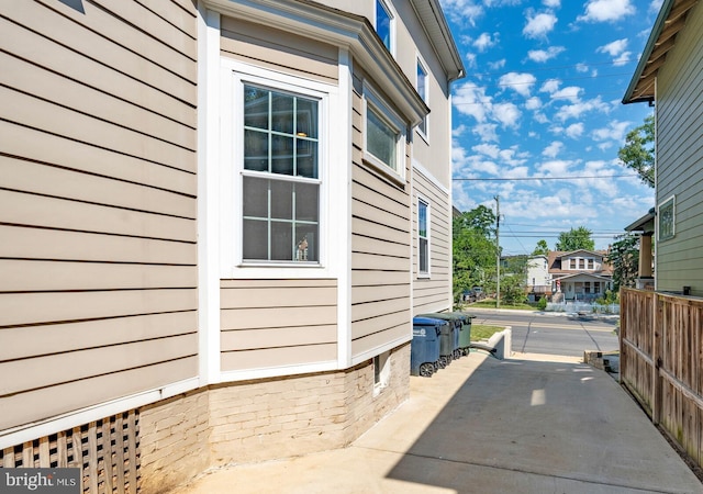 view of side of property featuring a patio