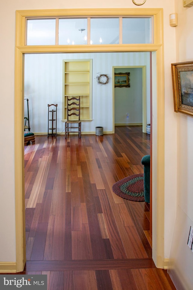 hallway featuring dark hardwood / wood-style flooring