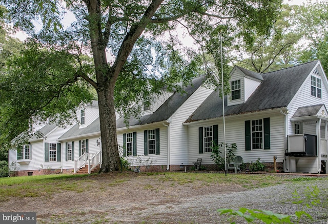 view of new england style home