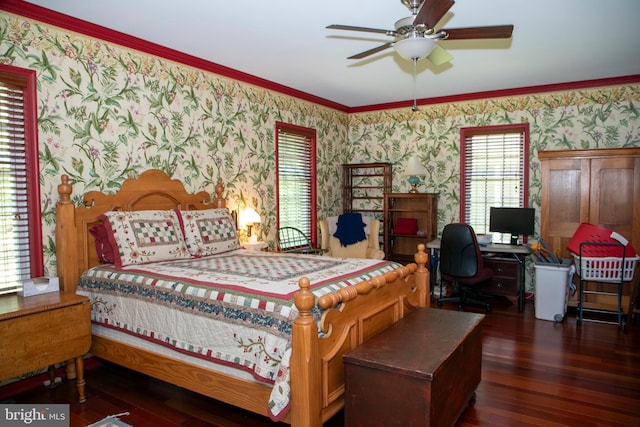 bedroom with ceiling fan, dark hardwood / wood-style flooring, and crown molding