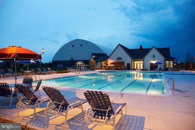 view of pool featuring a patio area