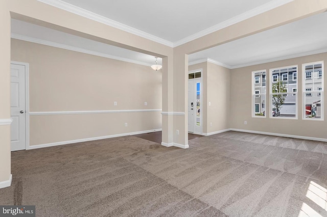 carpeted empty room with crown molding