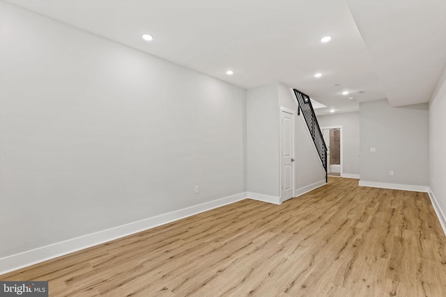 basement featuring light hardwood / wood-style flooring