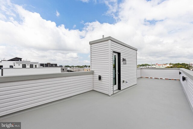 view of patio / terrace with a balcony