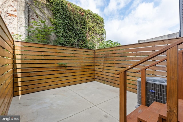 view of patio featuring cooling unit