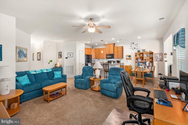 interior space with ceiling fan