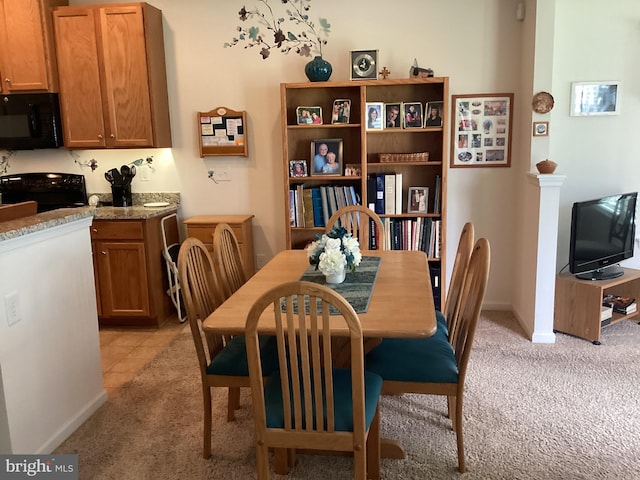 view of carpeted dining room