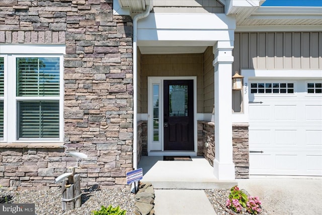 property entrance with a garage