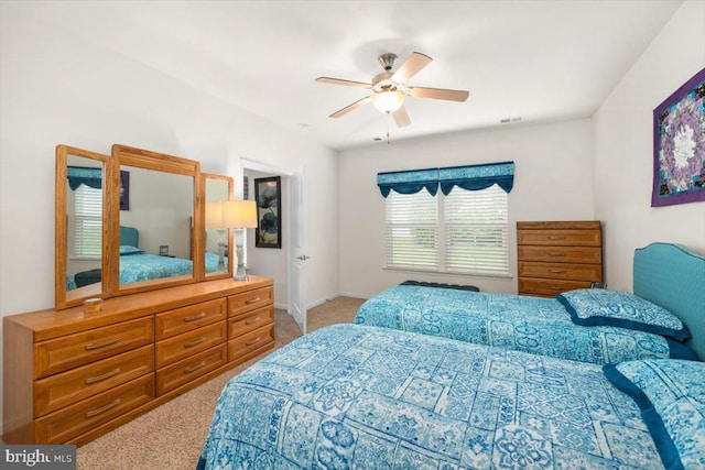 bedroom with carpet floors and ceiling fan