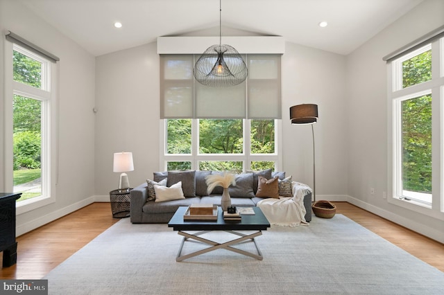 living room featuring light wood-style flooring and a wealth of natural light