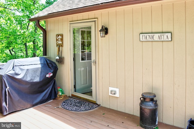 doorway to property with a deck