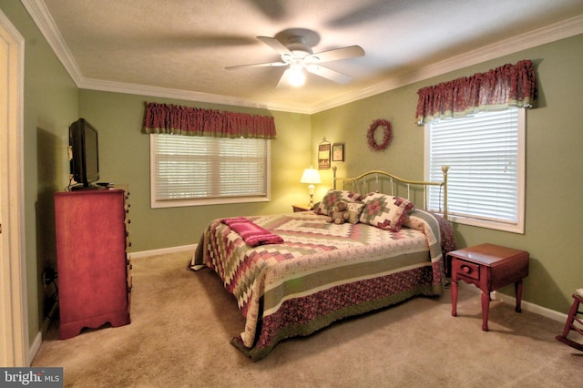 bedroom featuring ceiling fan, light carpet, and ornamental molding