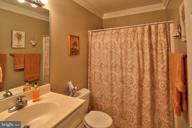 bathroom with vanity, toilet, crown molding, and walk in shower