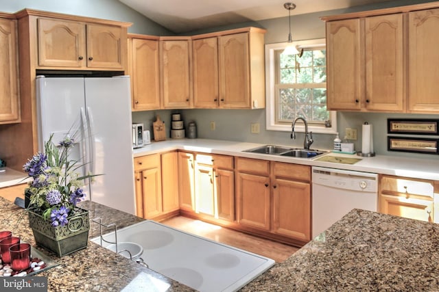 kitchen with white appliances, vaulted ceiling, sink, light hardwood / wood-style flooring, and hanging light fixtures