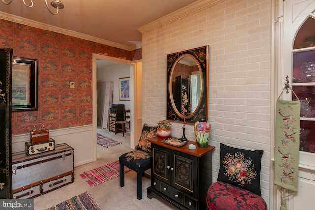 hall with crown molding and light carpet