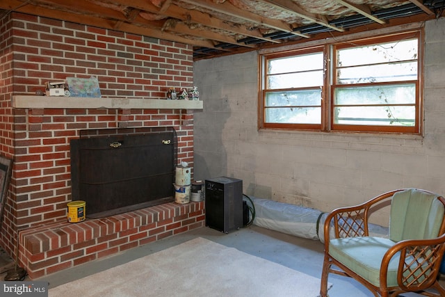 interior space with a brick fireplace