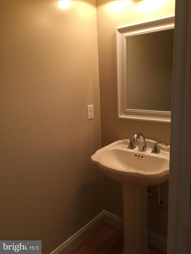 bathroom featuring baseboards