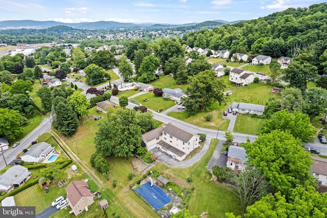 birds eye view of property featuring a mountain view and a residential view