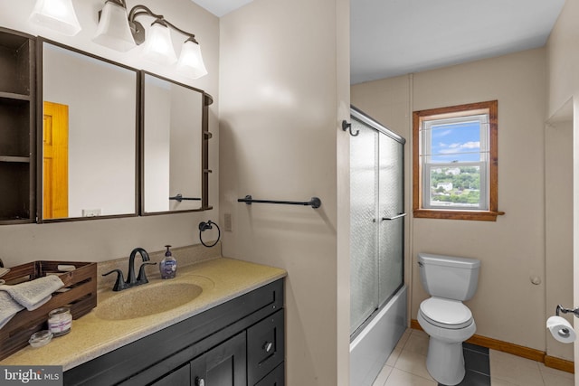 carpeted bedroom featuring a closet and ceiling fan