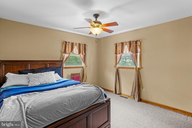 empty room featuring ceiling fan and light hardwood / wood-style flooring