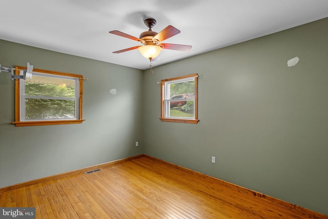 unfurnished room featuring wood-type flooring and ceiling fan