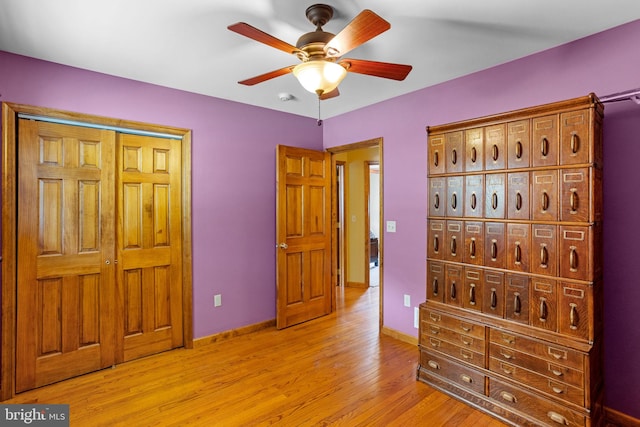 empty room featuring carpet flooring and ceiling fan