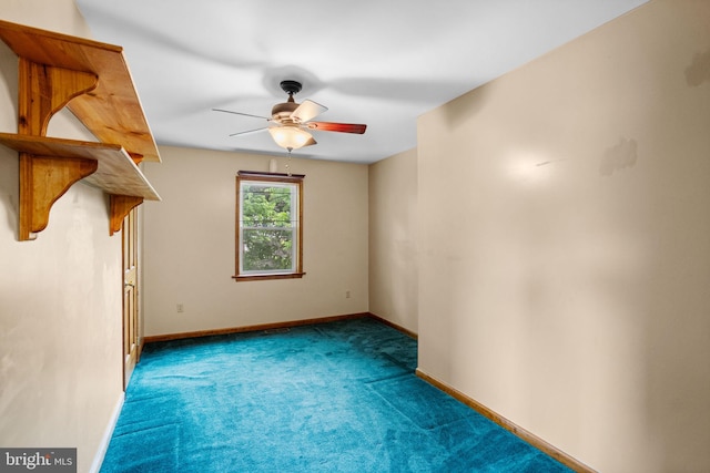 unfurnished room featuring carpet and ceiling fan