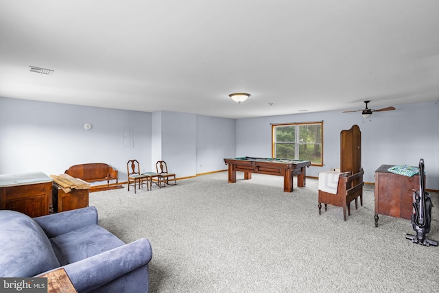 game room featuring light carpet, billiards, and ceiling fan with notable chandelier