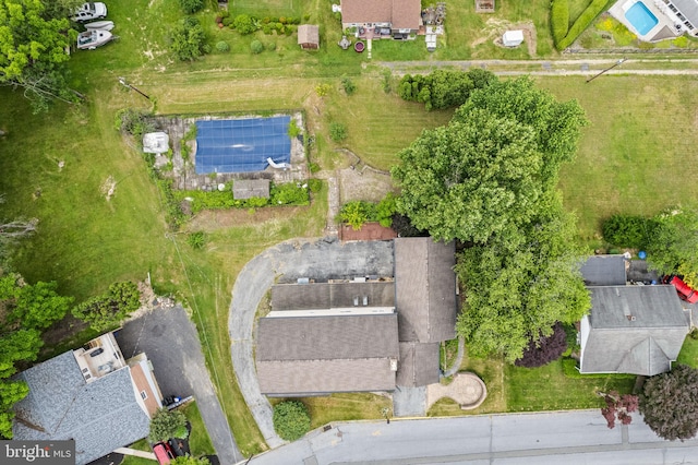 view of front facade with a front yard and a garage