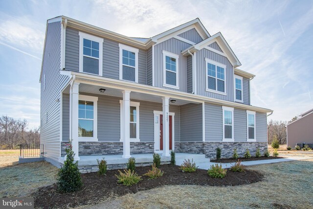 2107 Warrenton Rd, Fredericksburg, VA 22406 - craftsman inspired home with covered porch, board and batten siding, and stone siding