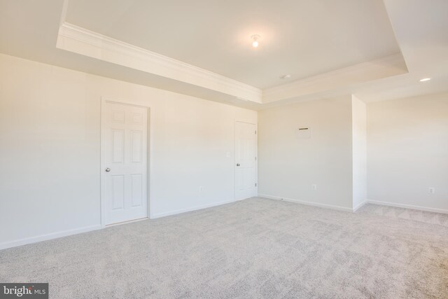 2107 Warrenton Rd, Fredericksburg, VA 22406 - spare room with a raised ceiling, ornamental molding, baseboards, and light colored carpet