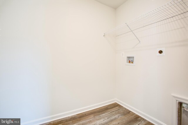2107 Warrenton Rd, Fredericksburg, VA 22406 - washroom featuring electric dryer hookup, washer hookup, baseboards, and wood finished floors